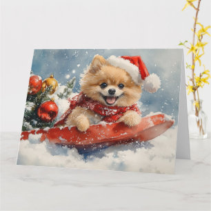 Cartão Cão Pomerânia no Trenó Deixe Nevar Natal