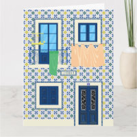Casa portuguesa de Lisboa com azulejos e pássaro