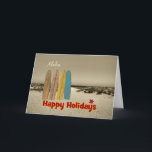 Cartão Christmas Card with Vintage Surfboards on Beach<br><div class="desc">A nostalgic graphic creation for this vintage looking Merry Christmas card featuring vintage looking long boards standing up in the sand with the ocean in the distance. Great card for a surfer and could work well for greetings from Hawaii,  Australia,  New Zealand.Original art © PamJArts</div>