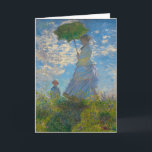 Cartão Claude Monet Mulher com Parasol<br><div class="desc">Envie uma mensagem embrulhada em beleza impressionista. Este cartão de saudação dobrado apresenta a Mulher de Claude Monet com um Parasol, pintada em blues, brancos suaves e verdes frescos. A graciosa cena mãe-filho, capturada em pinceladas luminosas, transmite calor, cuidado e charme de eterno. Com um interior vazio, o cartão é...</div>