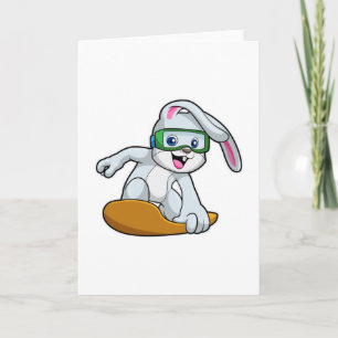 Cartão Coelho como praticante de snowboard com snowboard