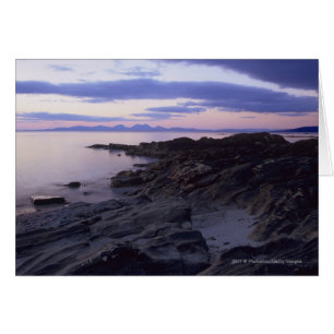 Cartão Costa rochosa no por do sol em Kintyre, Argyll,