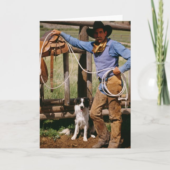 Cartão Cowboy posing with lasso and pet dog (Frente)