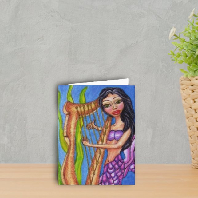 Cartão da Sereia com Harpa (Mermaid purple tail playing harp in seaweed on ocean blue notecards.)