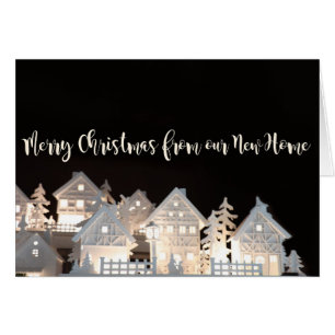 Cartão Das casas iluminadas Home novas do Natal