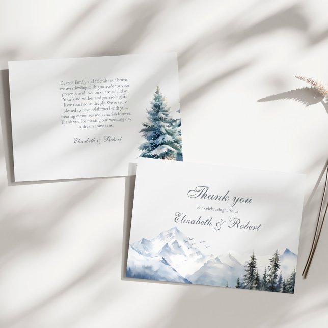 Cartão De Agradecimento Casamento de Pinheiros e Montanhas Neves (Snowy Mountain & Pine Trees Wedding Thank You Card on a sunny white table.)