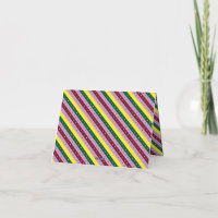 um padrão listrado multicolorido com pontos