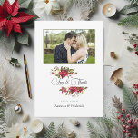 Cartão De Agradecimento Watercolor Poinsettia e Holly Christmas Photo<br><div class="desc">Expresse sua gratidão com este cartões de agradecimentos maravilhosamente projetado, com uma foto do casal e um monograma enquadrado por elegantes poinsettias de aquarela, sagrado, e vívido. Perfeito para um Natal ou casamento no inverno, este cartão captura o charme festivo da época de férias. Com os seus florais sazonais e...</div>