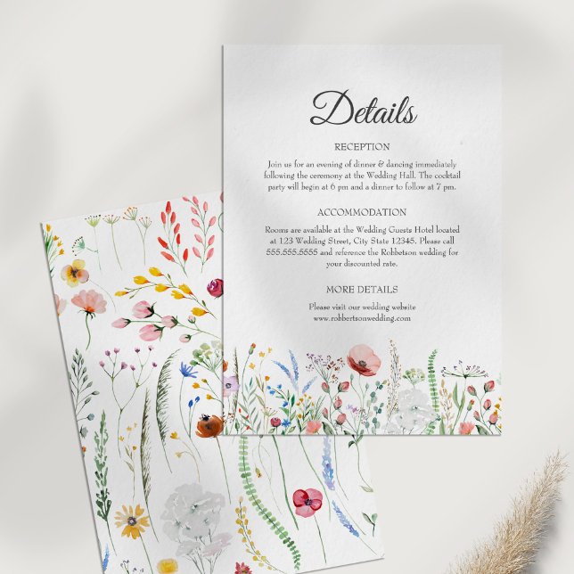 Cartão de Alojamento de Detalhes do Casamento de P (Wildflower Meadow Wedding Details Enclosure Card on a white table.)
