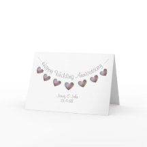 Cartão de aniversário de casamento com corações de