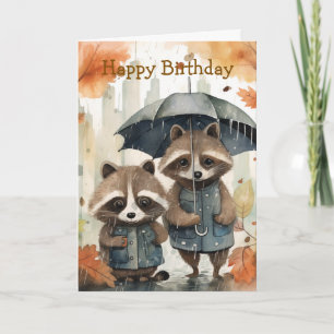 Cartão de Aniversário de Guaxinins Fofos na Chuva