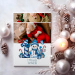 Cartão De Festividades 2 Foto Blue Snowman Primeiro Natal<br><div class="desc">Celebre a sua primeira temporada de festas com este alegre design de inverno com um número de xadrez azul, um adorável boneco de neve, e doces e presentes espalhados. Personalize-o com a fotografia do seu bebê e os detalhes do nascimento para criar uma guarnição que traz encanto e magia às...</div>
