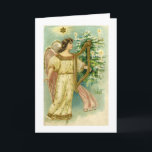 Cartão De Festividades Angel with harp at Christmas tree card<br><div class="desc">This Christmas card design is from a vintage postcard.  It has a blank interior. Customize it with your own message!</div>