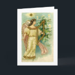 Cartão De Festividades Angel with harp at Christmas tree card<br><div class="desc">This Christmas card design is from a vintage postcard.  It has a blank interior. Customize it with your own message!</div>