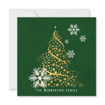 Árvore de Natal ouro de estrelas em flocos de neve