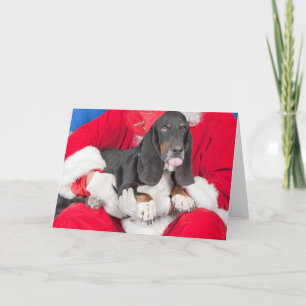 Cartão De Festividades Basset Sticking Tongue Out on Santa's Lap