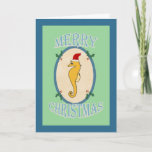 Cartão De Festividades Beach Christmas Sea horse Santa<br><div class="desc">Send your warmest seaside wished this Season with these Beach Christmas Sea horse Santa holiday cards. The cards have a vintage feel with a green and blue design featuring the words "Merry Christmas" in a fun font and a cute sea horse wearing a Santa hat.</div>