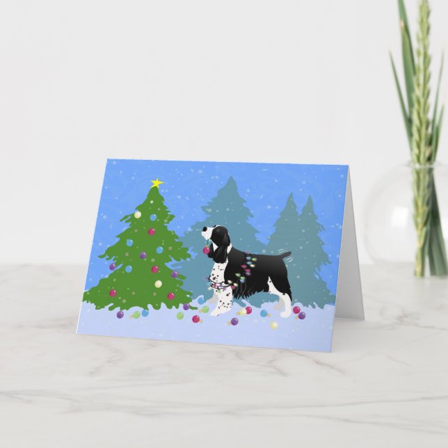 Cartão De Festividades Black Springer Spaniel Decorating Christmas Tree (Frente)