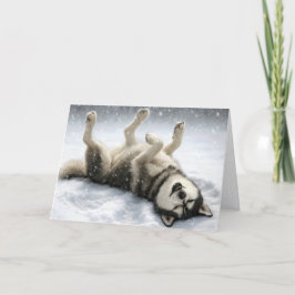 Cartão De Festividades Cachorro Siberiano de Natal Fazendo um Anjo de Nev