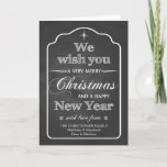 Cartão De Festividades Chalkboard - We Wish You a Merry Christmas<br><div class="desc">Add your family name to this trendy chalkboard holiday card with "We wish you a Merry Christmas and a Happy New Year" on the front. Designed by Simply Put by Robin.</div>
