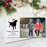 Cartão De Festividades Christmas Black Lab Dog wearing Santa Claus Hat<br><div class="desc">This adorable Christmas Black Lab Dog is wearing a santa Claus Hat - so much fun for the Holidays and sure to bring a smile to everyone's face - especially dog lovers! Personalize with your custom text and background color - just click on customize. Check out all our other black...</div>