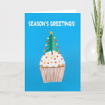 Cartão De Festividades Christmas Cupcake with Christmas Tree<br><div class="desc">A bright and cheerful Christmas Card with a decorated Christmas Tree on top of an iced cupcake,  from a handpainted paper collage by Judy Adamson. The front greeting,  in white text on a blue background,  is 'Season's Greetings!' and the inside is left blank for your own message.</div>