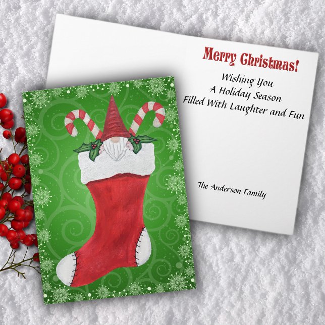 Cartão De Festividades Christmas Gnome Candy Canes Holly in Red Stocking (Gnome inside red Christmas stocking with holly leaves candy canes on green swirled Greeting Card.)