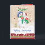 Cartão De Festividades Christmas, Godson. Snowman with Puppy<br><div class="desc">A sweet Christmas card for a young Goddson. It features an adorable little snow child hugging a cute snow puppy. He is wearing a blue hat, green scarf and red gloves while his puppy is wearing a Santa hat. Snow is falling around them and a decorative Christmas border trims the...</div>