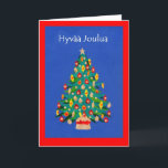 Cartão De Festividades Christmas Tree Card with Finnish Greeting<br><div class="desc">A festive Christmas Card with a Christmas Tree,  made from a handpainted,  paper collage,  and the greeting in Finnish. Please contact me through my store if you would like the front cover text changed (eg to a different language) and the inside is left blank for your own message.</div>