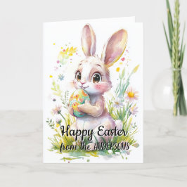 Cartão De Festividades Coelhinho bonito com ovos de Páscoa e flores