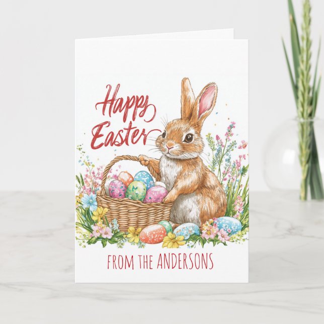 Cartão De Festividades Coelho segurando uma cesta cheia de ovos de Páscoa (Frente)