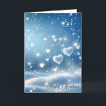 Cartão De Festividades Corações de Neve Flutuantes de Natal<br><div class="desc">Os corações flutuantes dançam-se em meio a uma paisagem serena como neve iluminada por um brilho etéreo suave. Todo o texto pode ser alterado.</div>