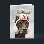 Cartão De Festividades Doberman Winter Merry Christmas<br><div class="desc">Doberman Pinscher winter portrait in sepia tones 
Doberman with ears erect,  wearing fluffy reindeer earmuffs set on a silver and white background with snowflakes and bokeh highlights
Merry Christmas in glitter silver script font is offered inside the card</div>