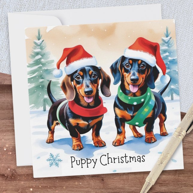 Cartão De Festividades Dois Dachshund Cujo Cachorro Pet Dog Puppy Natal (A Christmas card with illustration of two cute dachshund puppies and caption 'Puppy Christmas')