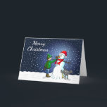 Cartão De Festividades Edifício Snowman<br><div class="desc">O menino construiu um boneco de neve que seu cachorro se sustenta e urina enquanto o menino dá ao boneco de neve um nariz de cenoura.</div>