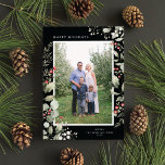 Cartão De Festividades Elegant Winter Watercolor Greenery Botanical Photo<br><div class="desc">This elegant holiday photo card features a single vertical photo framed by beautiful watercolor eucalyptus, holly, and berries over a chic black background. The editable greeting on the front says "Happy Holidays". The back of the card is a coordinating foliage pattern, which can be removed if desired. You can also...</div>
