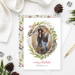 Cartão De Festividades Elegante Natal Watercolor Greenery Oval Foto<br><div class="desc">O cartão de Natal "Feliz" apresenta folhas verdes e bagas de Natal florais e design de uma foto oval. Inclui texto elegante e elegante de saudação de script e texto personalizado que pode ser personalizado na frente e no verso do cartão. Um espaço de fotos quadrado bônus e um padrão...</div>