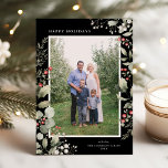 Cartão De Festividades Elegante Winter Watercolor Greenery Foto Botânica<br><div class="desc">Este elegante cartão com fotos de feriado apresenta uma foto vertical solteiro enquadrada por uma bela aquarela eucalipto, holly e bagas sobre um fundo preto chic. A saudação editável na frente diz "Felizes Feriados". A parte traseira da placa é um padrão de folhagem que pode ser removido se desejado. Você...</div>