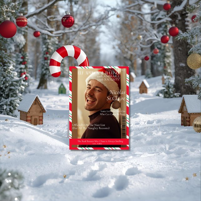 Cartão De Festividades Elf Approval Rating boyfriend husband magazine   (Front-view outdoor mockup of a 5x7 'Elf Approval Rating' card leaning against a giant candy cane in )