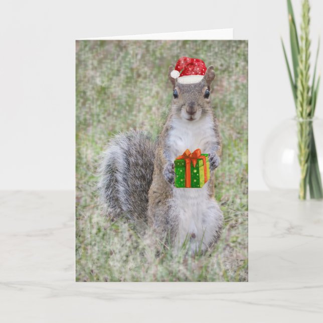 Cartão De Festividades Esquilo de Natal com o presente (Frente)