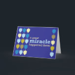 Cartão De Festividades Family Chanukah greeting card<br><div class="desc">A fun and whimsical greeting card for Chanukah featuring a blue and gold color palette of dreidels and a personalizable greeting inside. Don't see the colors or phrase you want? I'm happy to make a design with your choice of colors and fonts! Contact me for details.</div>