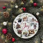 Cartão De Festividades Farmhouse Wreath | Photo Collage<br><div class="desc">A festive holiday card design in a unique round shape that features eight of your favorite photos arranged in a round wreath design accented by green watercolor foliage, pine cones and red holly berries on a white farmhouse wood shiplap background. "Joy" appears in the center in festive red hand lettered...</div>