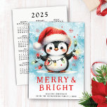 Cartão De Festividades Feliz de Natal Festiva e Pinguim Brito<br><div class="desc">Este cartão de Natal fofo personalizado apresenta um pinguim alegre em um chapéu vermelho de Papai Noel segurando luzes de Natal. Este design é com um fundo de cor azul-neve. Uma "Feliz & Brilho" dizendo cor vermelha vibrante e texto modelo para saudações, nome da família e um ano estão na...</div>