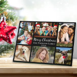 Cartão De Festividades Feliz Natal 6 Foto Collage Black<br><div class="desc">Cartões negros de colagem de imagens modernas com "Feliz Natal" em um roteiro elegante branco,  6 fotos de sua família e momentos do ano passado e seu nome e o ano em tipografia branca. No dentro,  personalize sua saudação e adicione seus primeiros nomes.</div>