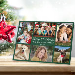 Cartão De Festividades Feliz Natal 6 Foto Collage Green<br><div class="desc">Um cartão verde de colagem de fotos moderna com "Feliz Natal" em um roteiro elegante branco,  6 fotos de sua família e momentos do último ano e seu nome e o ano em tipografia branca. No dentro,  personalize sua saudação e adicione seus primeiros nomes.</div>