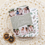 Cartão De Festividades Feliz Natal Caligrafia Verde 6 Fotos<br><div class="desc">Espalhe a alegria de férias com este charmoso Cartões de foto de Natal verde de sábio! A frente apresenta "Feliz Natal" na caligrafia manuscrita, com seu nome de família e o ano em um dos florescimentos. Adicione um toque pessoal com seis fotos personalizadas — três no topo e três no...</div>