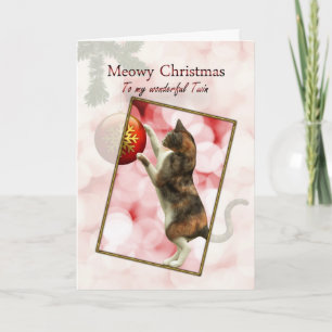 Cartão De Festividades Feliz Natal com um gato brincalhão.