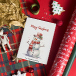 Cartão De Festividades Feliz Snowman Feliz Natal Nome da Família Personal<br><div class="desc">Este charmoso cartão de feriado apresenta um bonitinho bonitão ilustrado em aquarela macia, acrescentando um toque alegre e festivo aos seus cartões de natal. A inscrição "Feliz Natal" é colocada elegantemente acima do boneco de neve, enquanto a parte inferior do cartão oferece um espaço personalizável para o seu nome familiar,...</div>