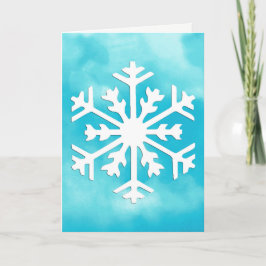 Cartão De Festividades Floco de neve branco em fundo azul de aquarela