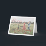 Cartão De Festividades Foto de Script Russo no Natal Moderno<br><div class="desc">Cartão de Natal com fotos modernas, com um design simples e mínimo, com "Feliz Natal" num elegante e vermelho roteiro rústico sobre a sua foto favorita junto com o seu nome de família. O modelo inclui uma camada branca para ajudar o texto a se destacar sobre sua foto e pode...</div>